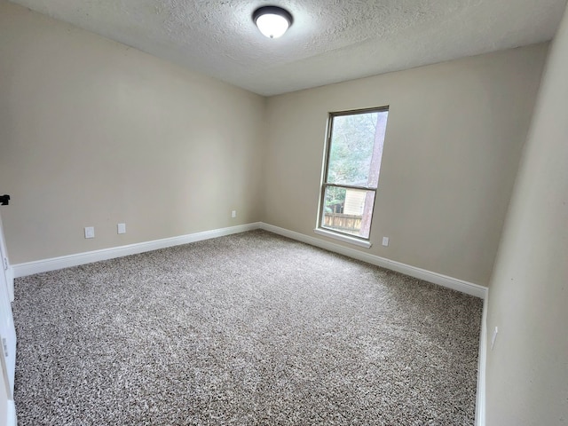 3407 Sandy Forks Dr, Houston, TX 77339 - unfurnished room with a textured ceiling and carpet flooring