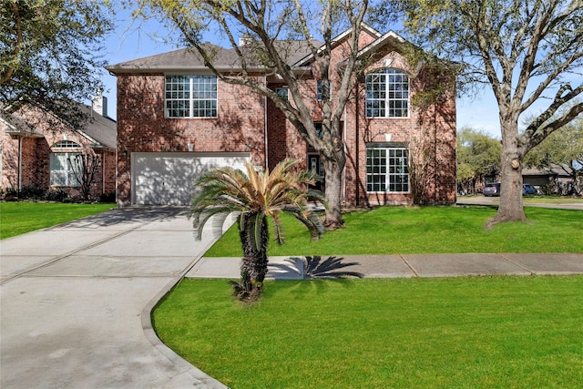 537 Green Cedar Dr, League City, TX 77573 - traditional-style home featuring driveway, a garage, brick siding, and a front yard
