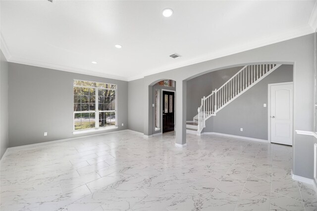 537 Green Cedar Dr, League City, TX 77573 - unfurnished living room with arched walkways, stairs, ornamental molding, recessed lighting, and light marble finish floors
