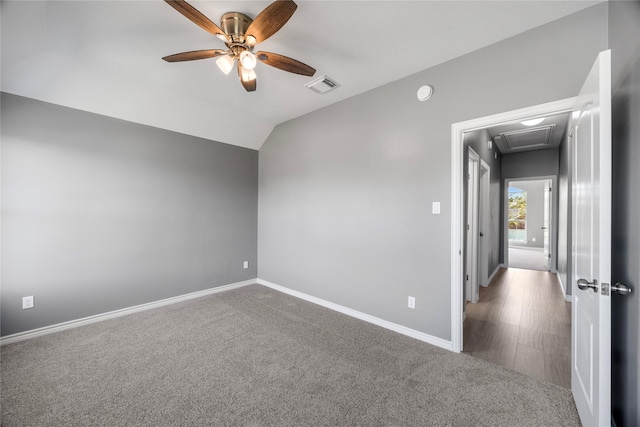 537 Green Cedar Dr, League City, TX 77573 - unfurnished room featuring a ceiling fan, carpet, lofted ceiling, and attic access