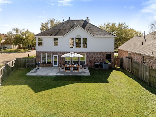 537 Green Cedar Dr, League City, TX 77573 - rear view of house featuring brick siding, a fenced backyard, a patio, and a chimney