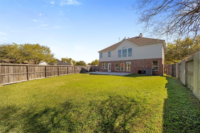 537 Green Cedar Dr, League City, TX 77573 - back of house with brick siding, a fenced backyard, a patio area, and a chimney