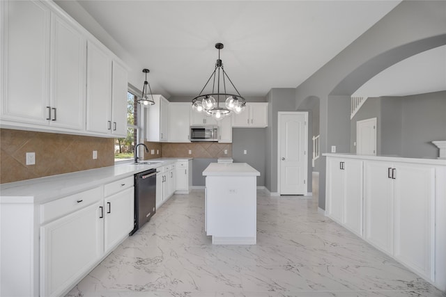 537 Green Cedar Dr, League City, TX 77573 - kitchen with dishwasher, stainless steel microwave, light marble finish flooring, backsplash, and white cabinetry