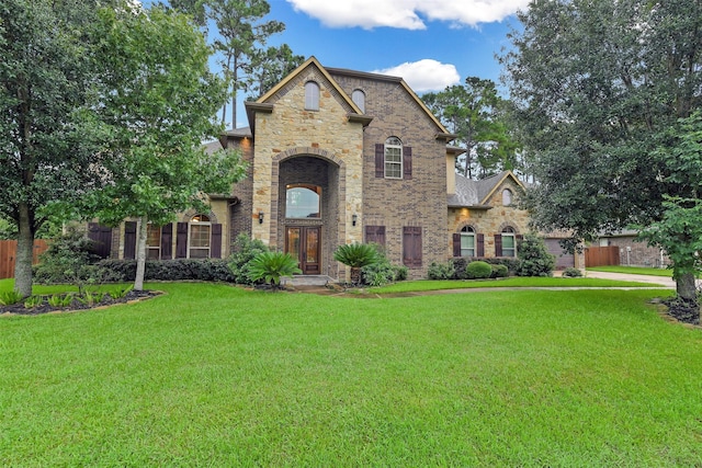 13622 Kluge Corner Ln, Cypress, TX 77429 - french country inspired facade featuring stone siding and brick siding
