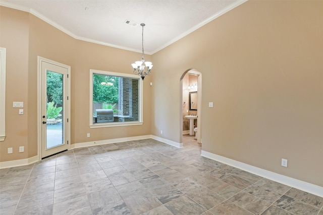 13622 Kluge Corner Ln, Cypress, TX 77429 - empty room with arched walkways, ornamental molding, a chandelier, and stone finish floors