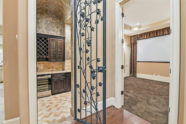 13622 Kluge Corner Ln, Cypress, TX 77429 - wine area with wine cooler, a dry bar, and ornamental molding