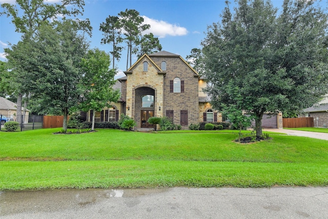 13622 Kluge Corner Ln, Cypress, TX 77429 - view of front of property featuring stone siding, driveway, and a garage