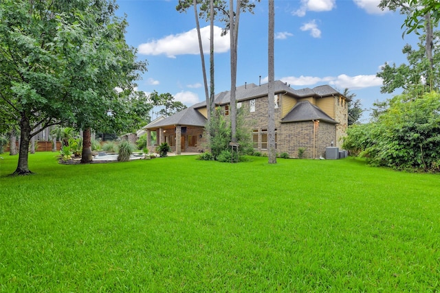13622 Kluge Corner Ln, Cypress, TX 77429 - view of front of house with a front lawn and stone siding