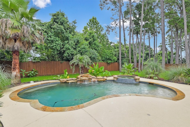 13622 Kluge Corner Ln, Cypress, TX 77429 - view of pool with a fenced backyard, a pool with connected hot tub, and a patio