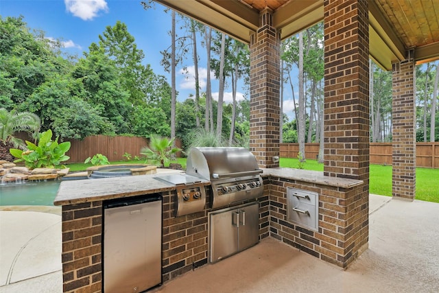 13622 Kluge Corner Ln, Cypress, TX 77429 - fenced backyard with area for grilling and a patio