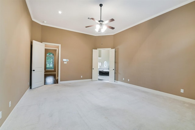 13622 Kluge Corner Ln, Cypress, TX 77429 - unfurnished bedroom featuring ornamental molding, light carpet, ensuite bathroom, and a ceiling fan