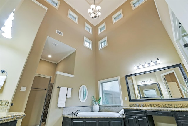 13622 Kluge Corner Ln, Cypress, TX 77429 - full bath featuring a towering ceiling, vanity, a chandelier, plenty of natural light, and a tub