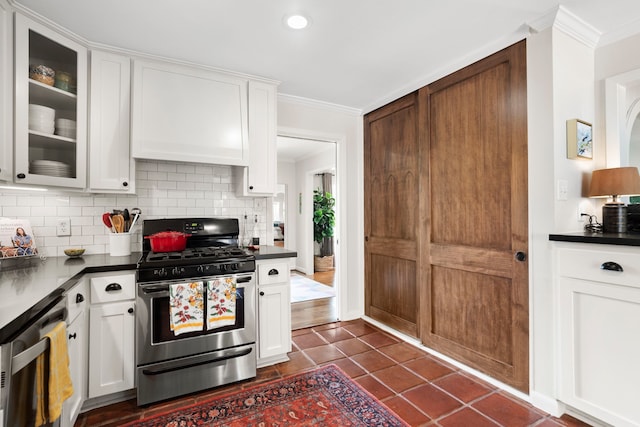 1219 Del Norte St, Houston, TX 77018 - kitchen with appliances with stainless steel finishes, dark countertops, backsplash, crown molding, and recessed lighting
