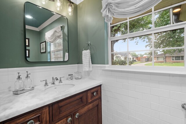 1219 Del Norte St, Houston, TX 77018 - bathroom with vanity, healthy amount of natural light, and ornamental molding
