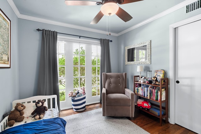 1219 Del Norte St, Houston, TX 77018 - sitting room with wood finished floors, crown molding, and a ceiling fan