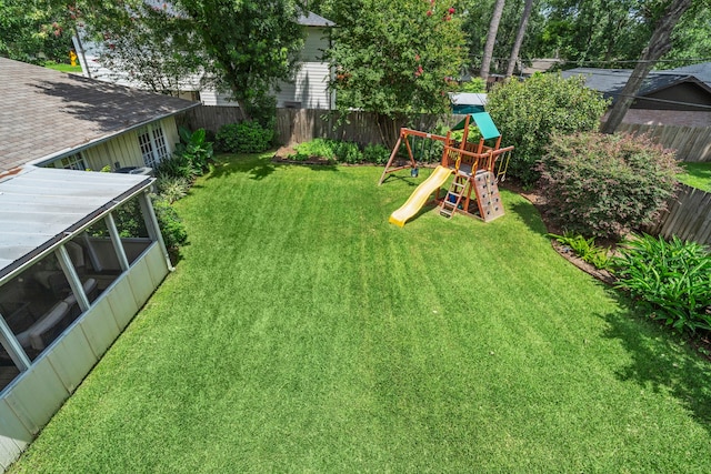 1219 Del Norte St, Houston, TX 77018 - fenced backyard with a playground