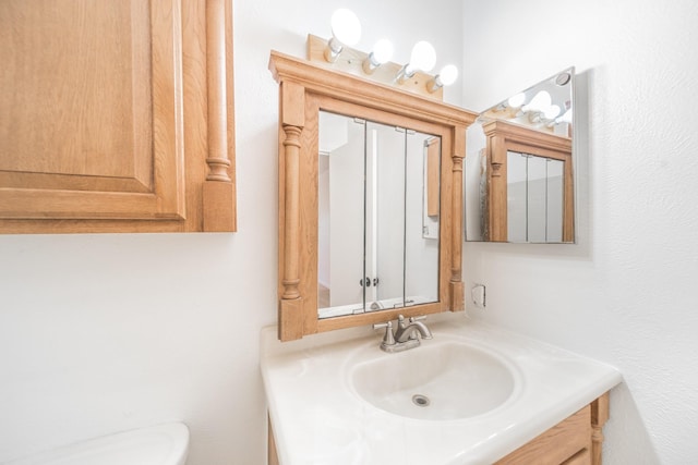7256 Regency Square Ct Unit 7256, Houston, TX 77036 - bathroom with vanity and toilet