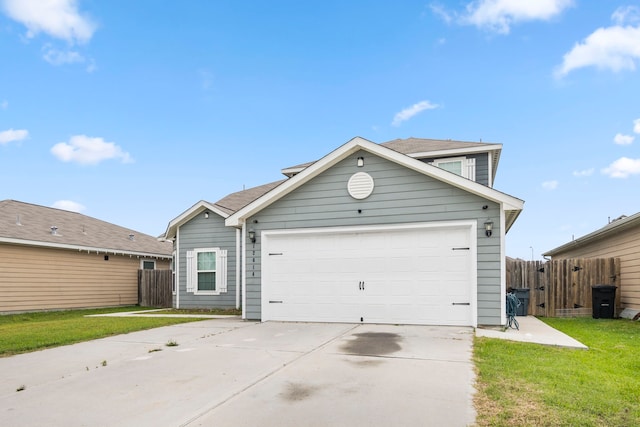 12614 Pelican Bay Dr, Houston, TX 77038 - view of front facade with concrete driveway and an attached garage