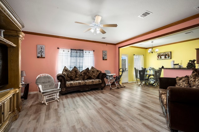 12614 Pelican Bay Dr, Houston, TX 77038 - living room featuring a ceiling fan, wood finished floors, crown molding, and a chandelier