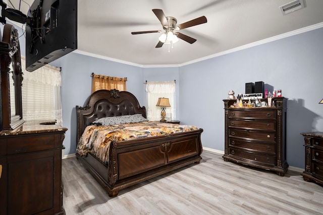 12614 Pelican Bay Dr, Houston, TX 77038 - bedroom with light wood-style floors, multiple windows, ornamental molding, and a ceiling fan