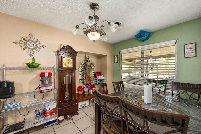 12337 Kayla Ln, Houston, TX 77015 - dining space with a textured ceiling and light tile patterned floors