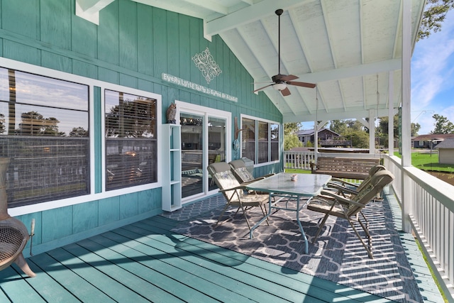 1575 Yaupon Cove Dr, Onalaska, TX 77360 - deck featuring a ceiling fan and outdoor dining space