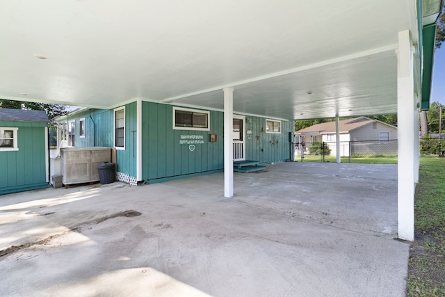 1575 Yaupon Cove Dr, Onalaska, TX 77360 - view of patio / terrace featuring a carport