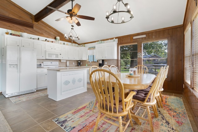 1575 Yaupon Cove Dr, Onalaska, TX 77360 - tiled dining room featuring a chandelier, wooden walls, ceiling fan, beamed ceiling, and high vaulted ceiling