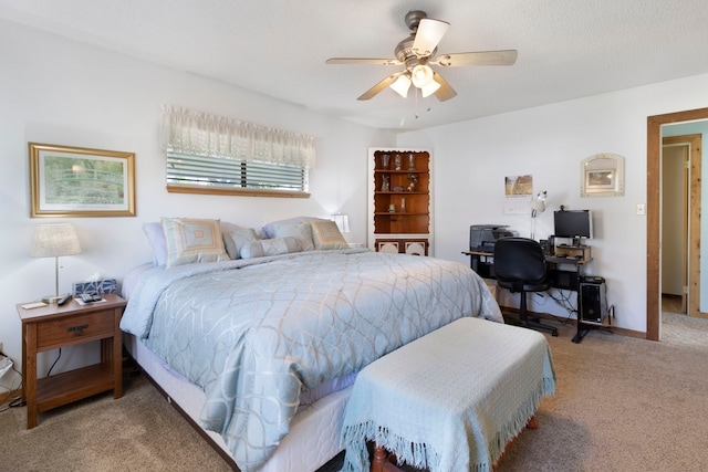 1575 Yaupon Cove Dr, Onalaska, TX 77360 - bedroom featuring carpet floors, an office area, and ceiling fan