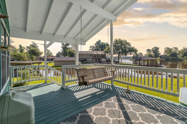 1575 Yaupon Cove Dr, Onalaska, TX 77360 - deck featuring a water view and a lawn