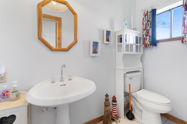 1575 Yaupon Cove Dr, Onalaska, TX 77360 - bathroom with toilet and tile patterned floors