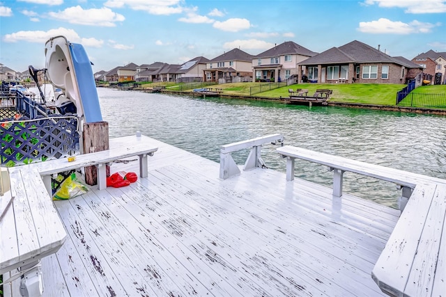 24030 Cannon Anello Ct, Katy, TX 77493 - dock area with a residential view, a water view, and a lawn