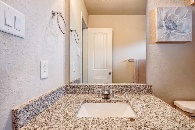 24030 Cannon Anello Ct, Katy, TX 77493 - bathroom featuring vanity and a textured wall