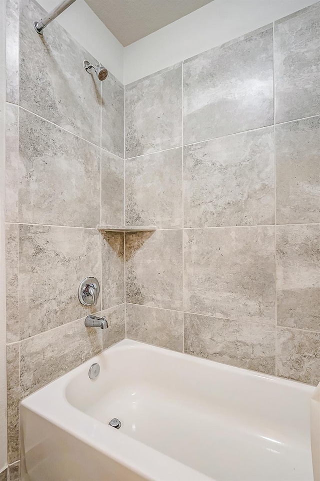 24030 Cannon Anello Ct, Katy, TX 77493 - bathroom featuring bathtub / shower combination