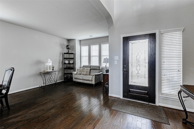 24030 Cannon Anello Ct, Katy, TX 77493 - foyer entrance with arched walkways and wood finished floors
