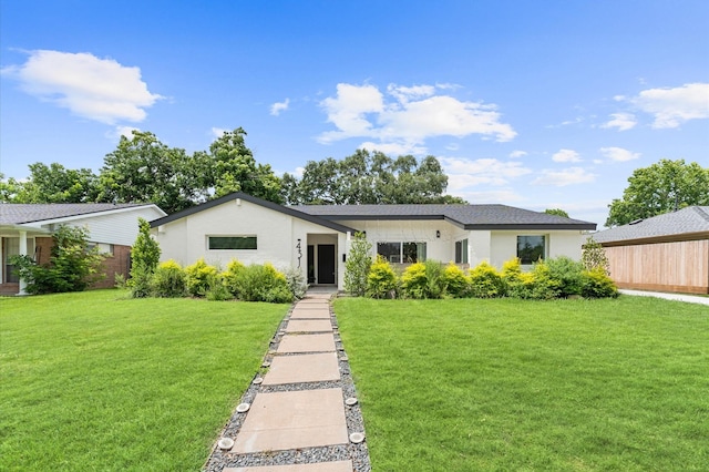 4318 Cheena Dr, Houston, TX 77096 - view of front of property with a front lawn
