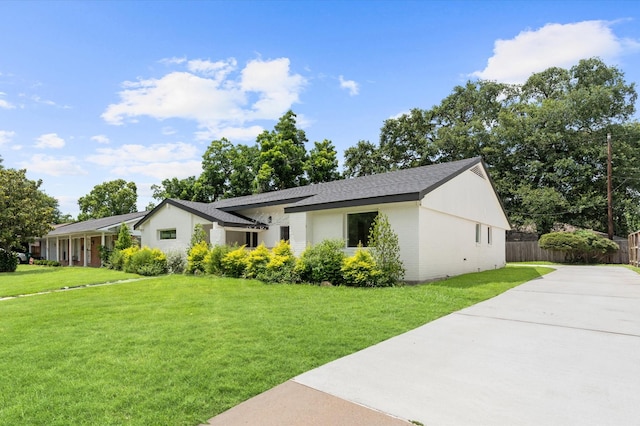 4318 Cheena Dr, Houston, TX 77096 - view of front of property featuring concrete driveway, brick siding, and roof with shingles