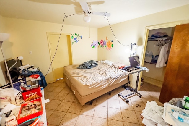 890 Rattlesnake Rd, Harker Heights, TX 76548 - bedroom featuring ceiling fan, a closet, and light tile patterned flooring