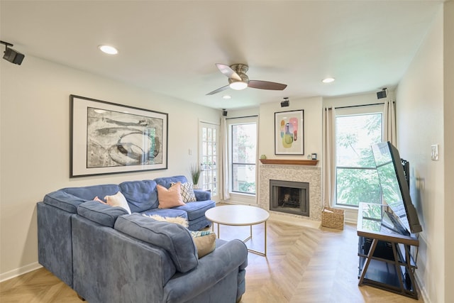 1601 S Shepherd Dr Unit 222, Houston, TX 77019 - living area featuring plenty of natural light, a ceiling fan, a fireplace, and recessed lighting