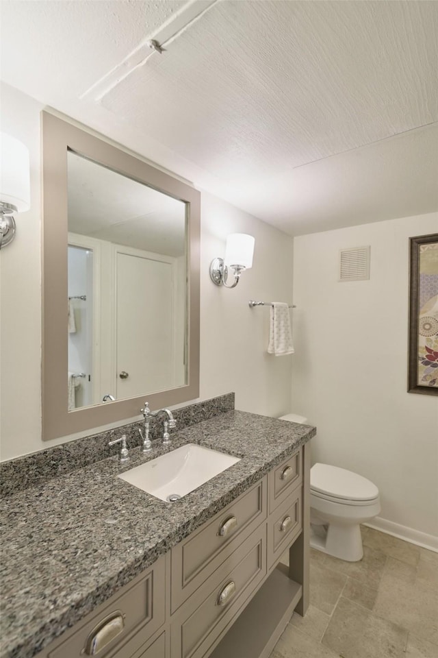 1601 S Shepherd Dr Unit 222, Houston, TX 77019 - bathroom featuring vanity and toilet
