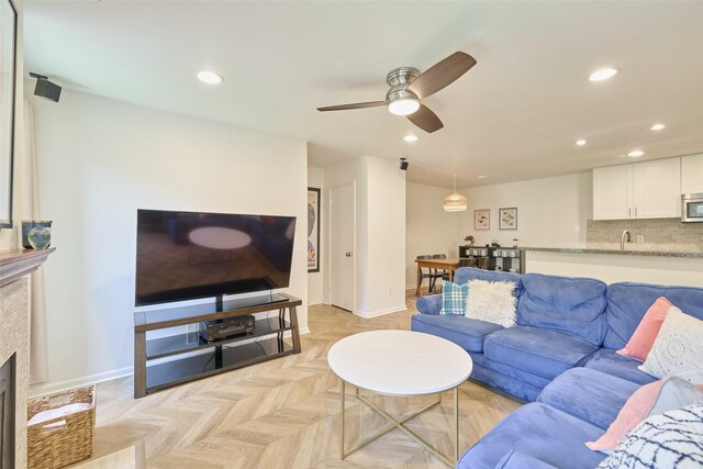 1601 S Shepherd Dr Unit 222, Houston, TX 77019 - living area with recessed lighting, ceiling fan, and a tile fireplace