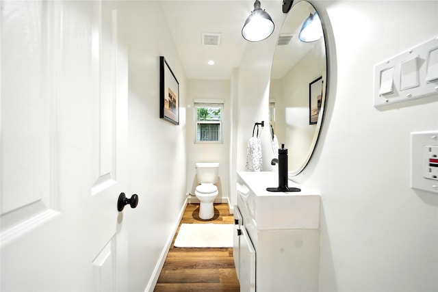 1610 Antoine Dr, Houston, TX 77055 - bathroom featuring vanity and wood finished floors