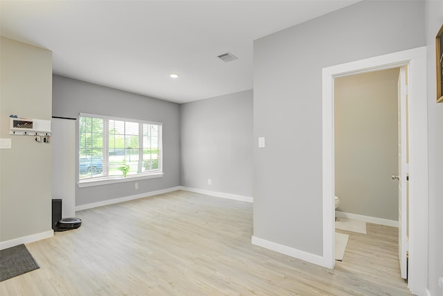 17465 Rosewood Manor Ln, New Caney, TX 77357 - spare room with light wood-type flooring and recessed lighting