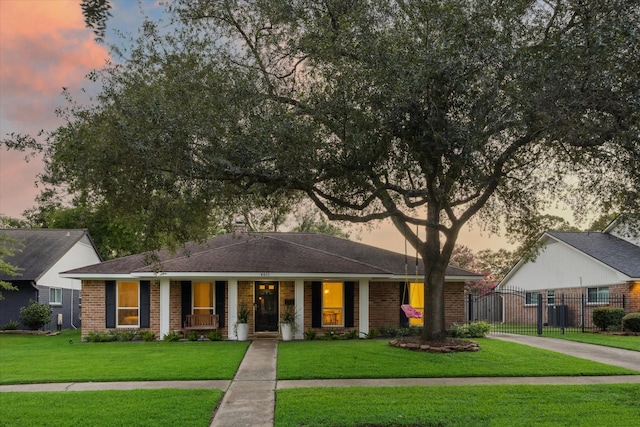 4611 Dunsmere St, Houston, TX 77018 - view of front of property featuring brick siding, concrete driveway, a porch, and a gate
