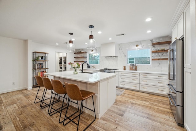 4611 Dunsmere St, Houston, TX 77018 - kitchen featuring open shelves, high end refrigerator, light countertops, premium range hood, and recessed lighting