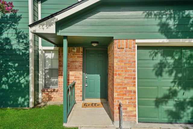 9323 Goodmeadow Dr, Houston, TX 77064 - doorway to property with brick siding and a garage