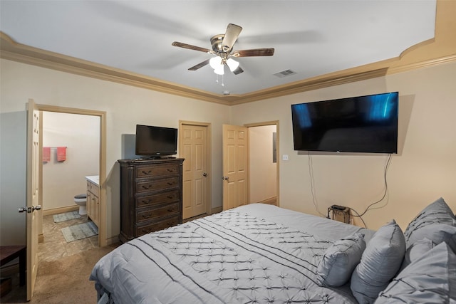 1541 3rd St, Hempstead, TX 77445 - bedroom with ornamental molding, light carpet, connected bathroom, and ceiling fan