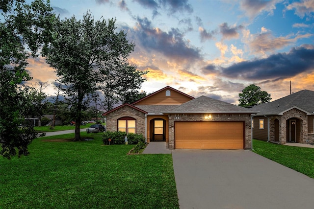 1541 3rd St, Hempstead, TX 77445 - view of front of property with a garage, concrete driveway, a front yard, a shingled roof, and brick siding