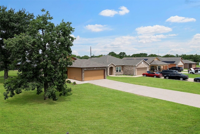 1541 3rd St, Hempstead, TX 77445 - view of front of house with a garage, a front lawn, and driveway