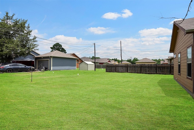 1541 3rd St, Hempstead, TX 77445 - view of yard featuring a garage and a shed
